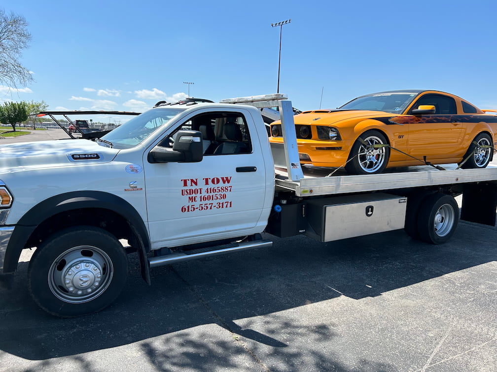 Tow Truck with Orange Ford Mustang